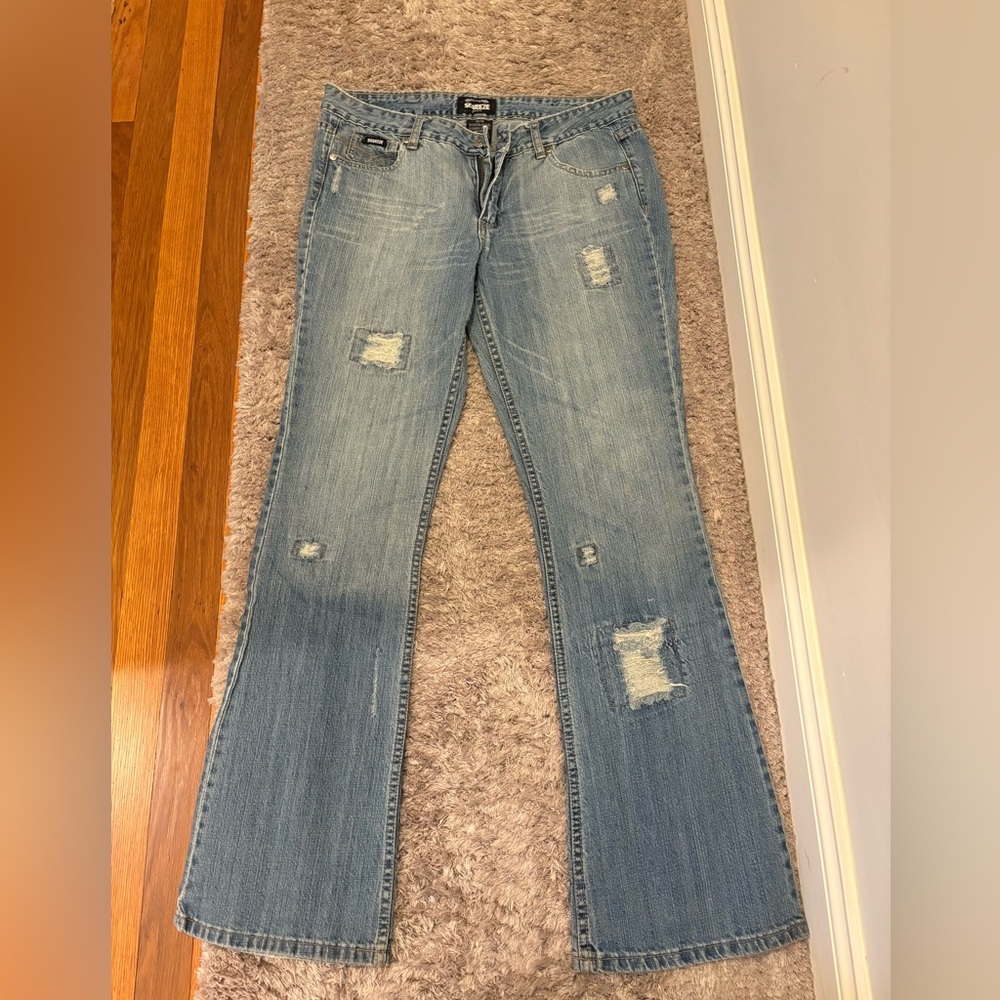 Squeeze Light Blue Distressed Flare Jeans
